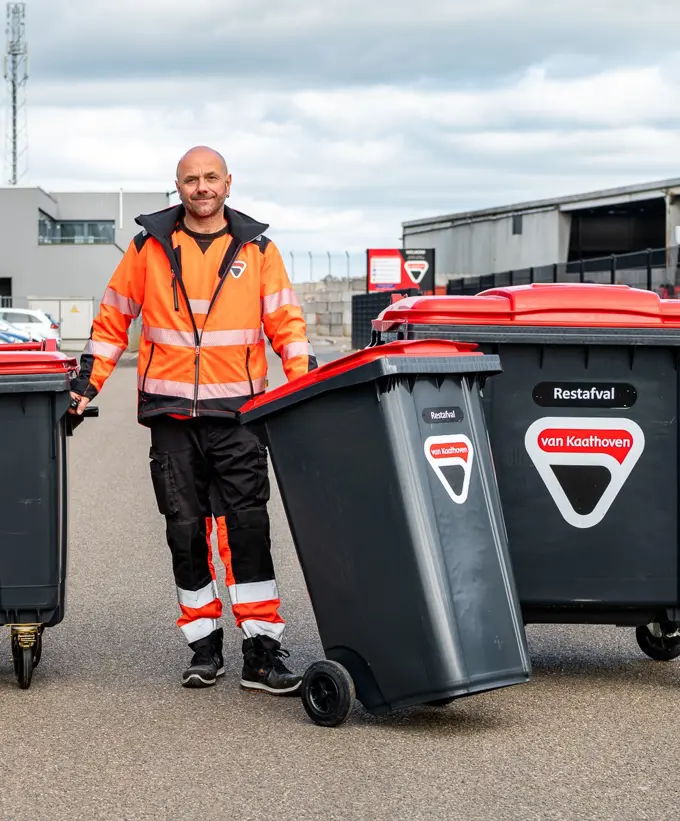 A man with Van Kaathoven designed rubbish bins