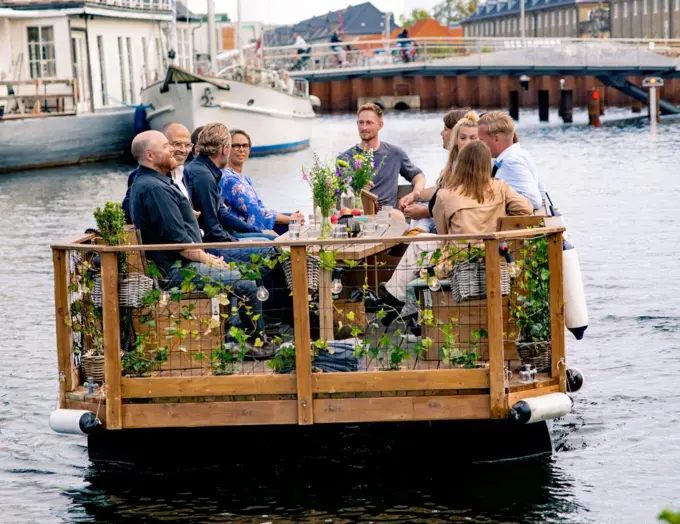 Wooden raft boat used to guide tourists around Copenhagen waterways