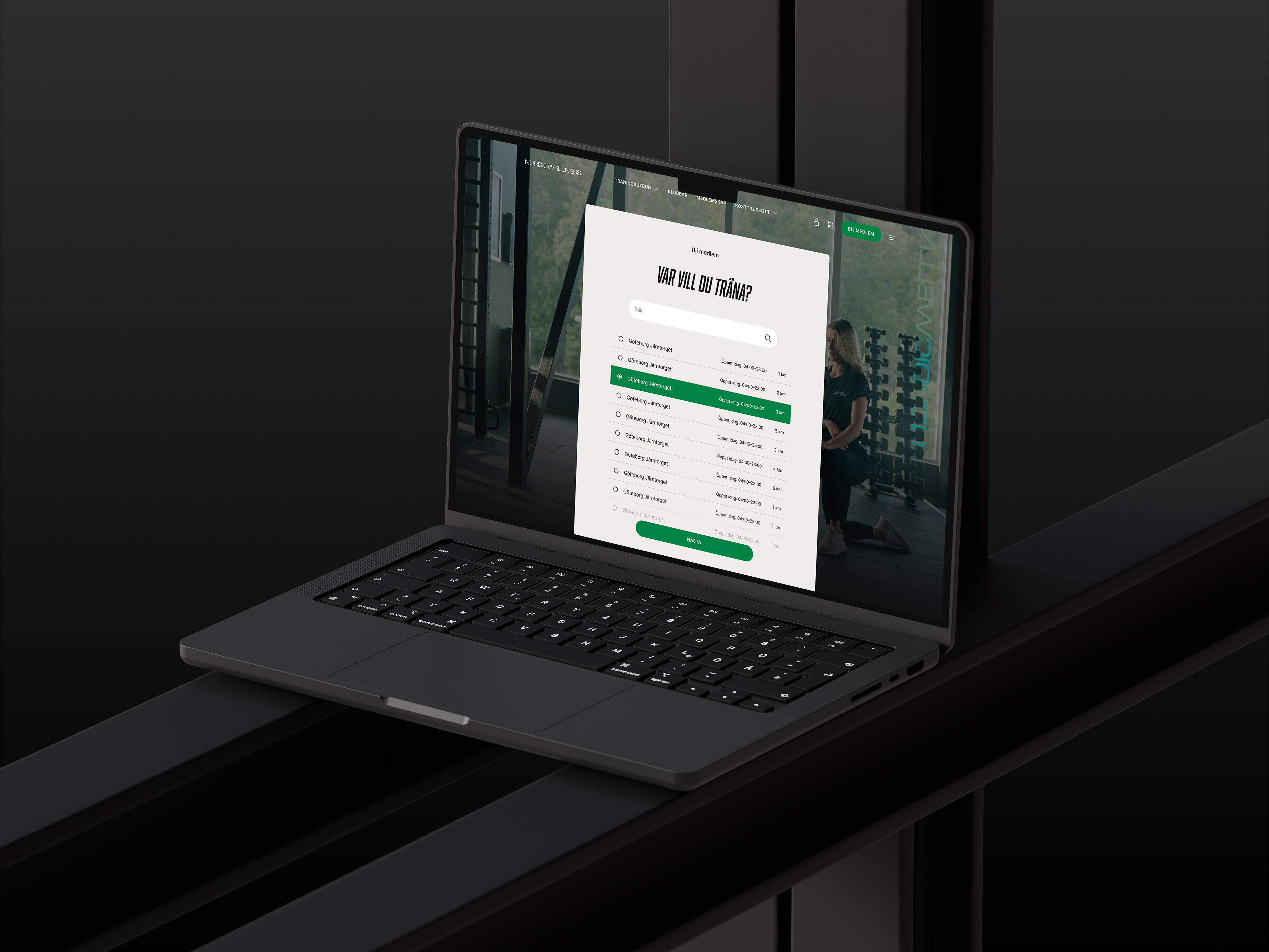 Nordic Wellness sign-up flow on a laptop, showing a "Var vill du träna?" step where users search for a gym and pick one from a list showing opening hours and distance.