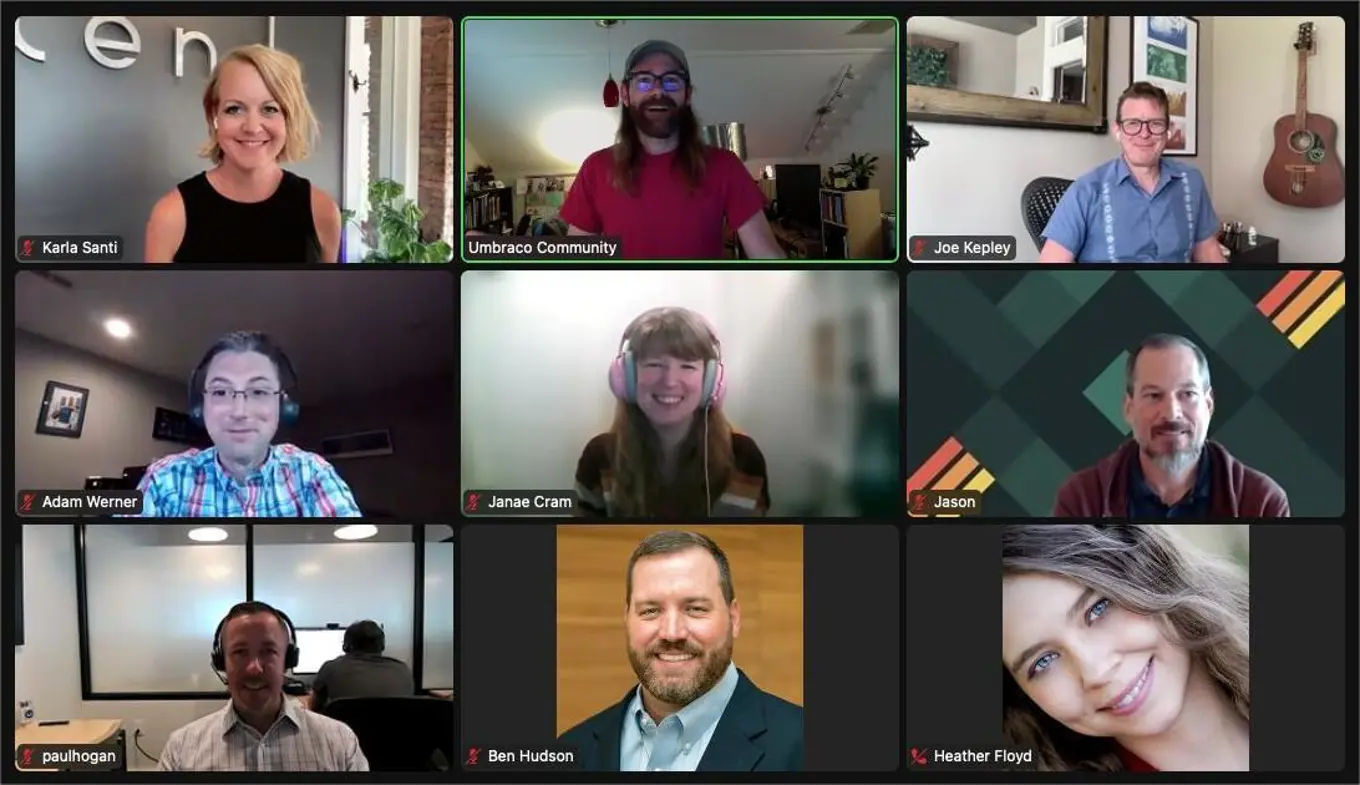 A virtual group meeting screenshot featuring nine participants. Each person is shown in their own video box, smiling and engaging in the call. The participants include Karla Santi, Adam Werner, Janae Cram, Joe Kepley, Jason, Paul Hogan, Ben Hudson, Heather Floyd, and a representative of the Umbraco Community. Everyone appears to be in good spirits, with a mix of professional and relaxed settings visible in their backgrounds.