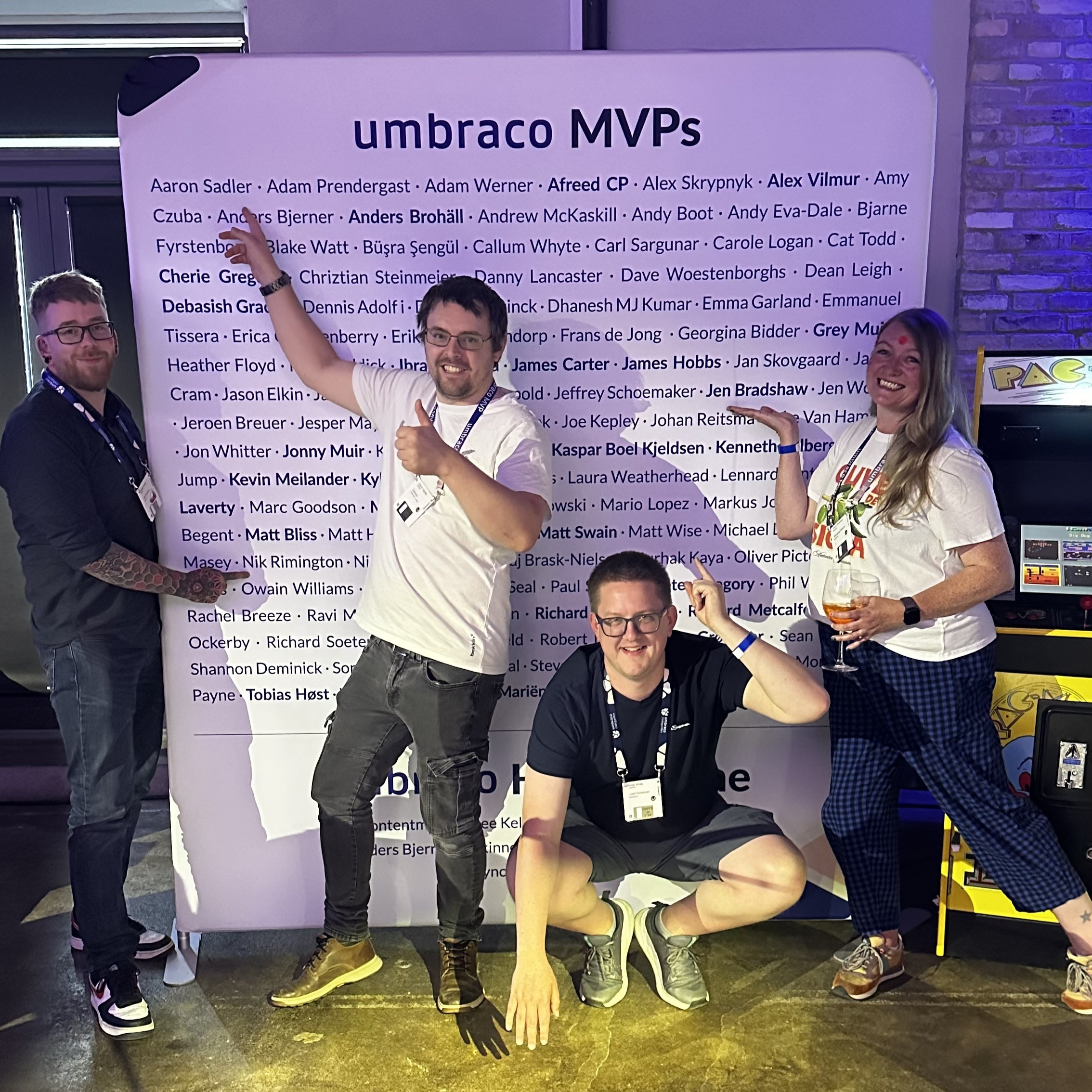Jenny with fellow Moriyama MVPs in front of the MVP wall, Codegarden 2025