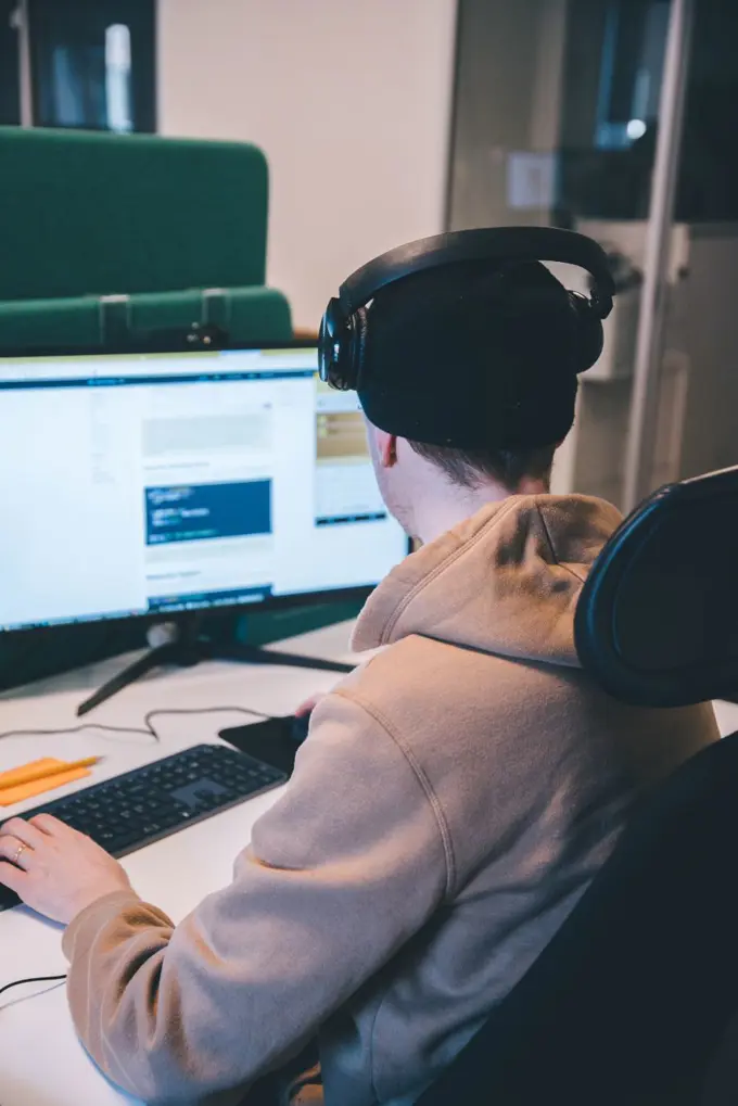 Toxic Employee  working at computer