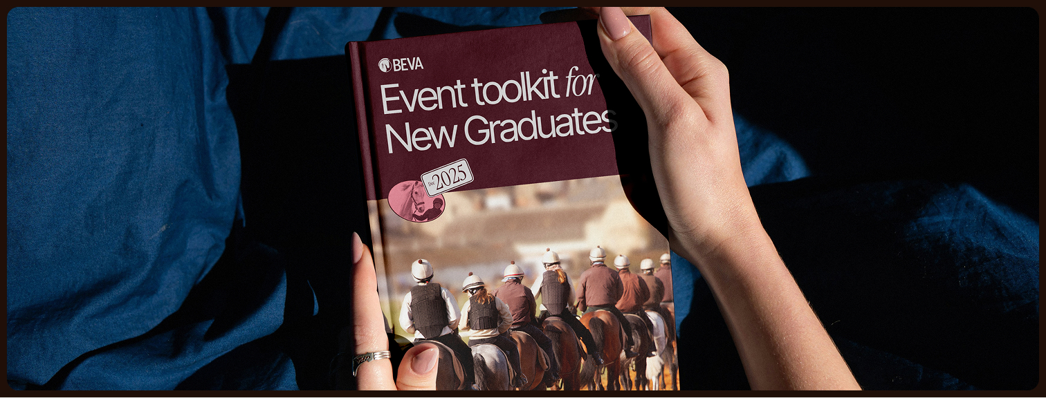 Hand holding a BEVA booklet titled Event toolkit for New Graduates 2025