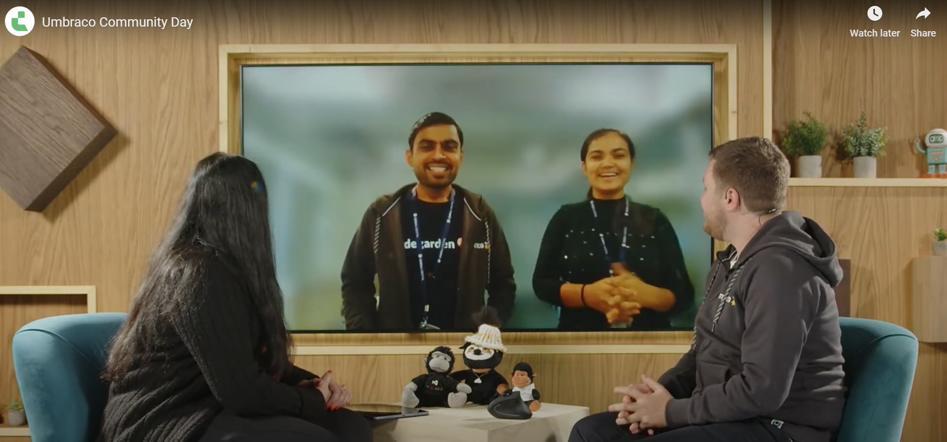 Nikhil and Asha presenting at Umbraco Community Day, with hosts Poornima Nayar and Callum Whyte