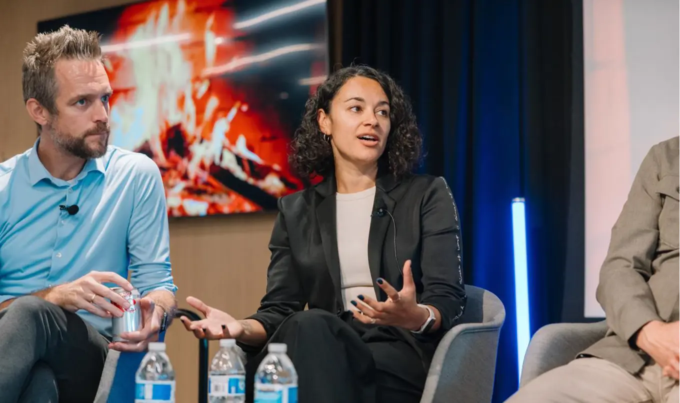 Emma Burstow on stage during a panel at the Umbraco US Partner Summit 2024