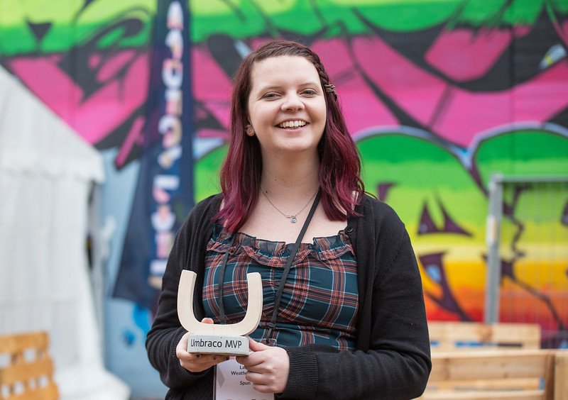 Woman holding MVP award