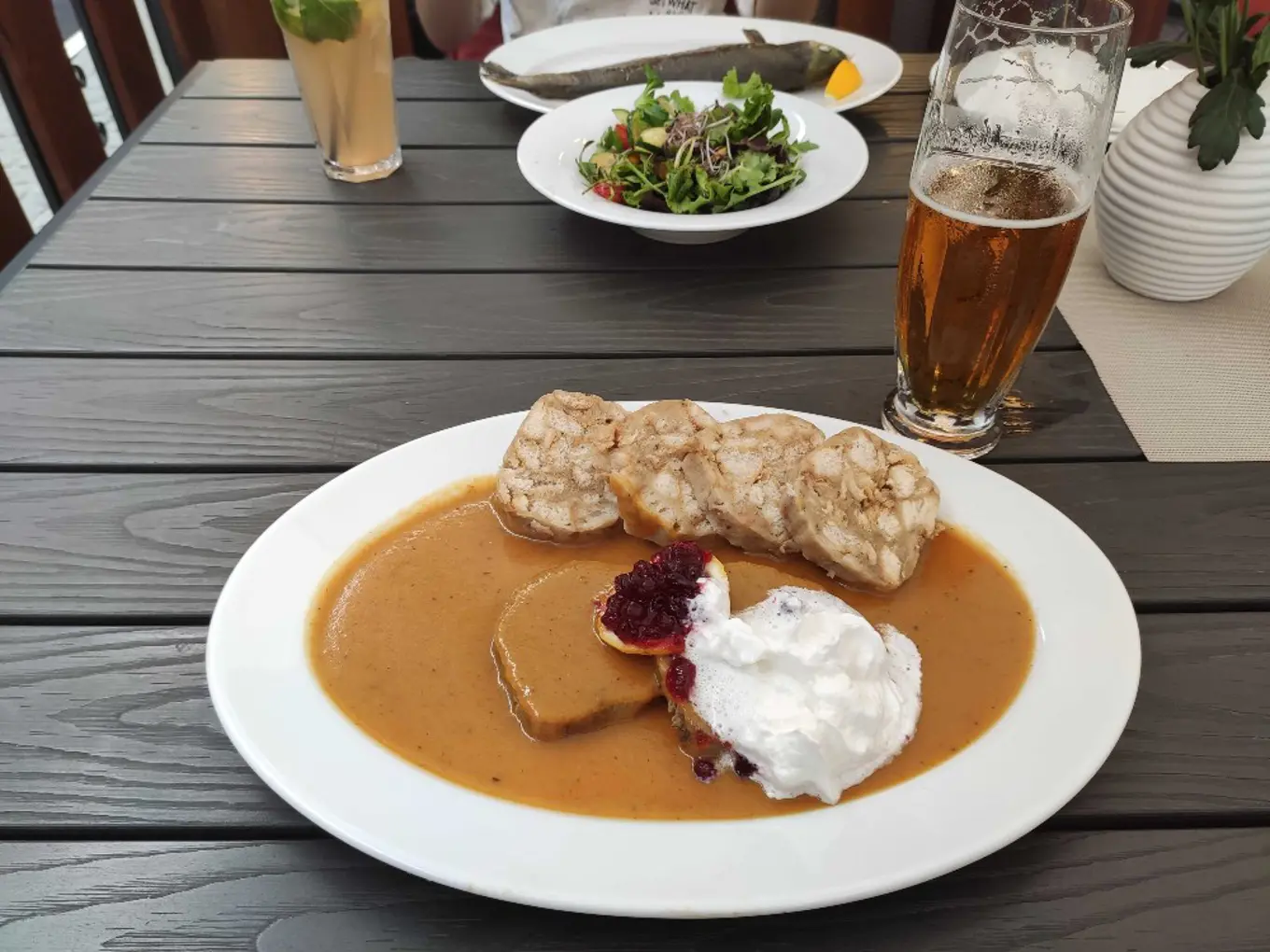 The Czech national dish, svickova, paired with a beer