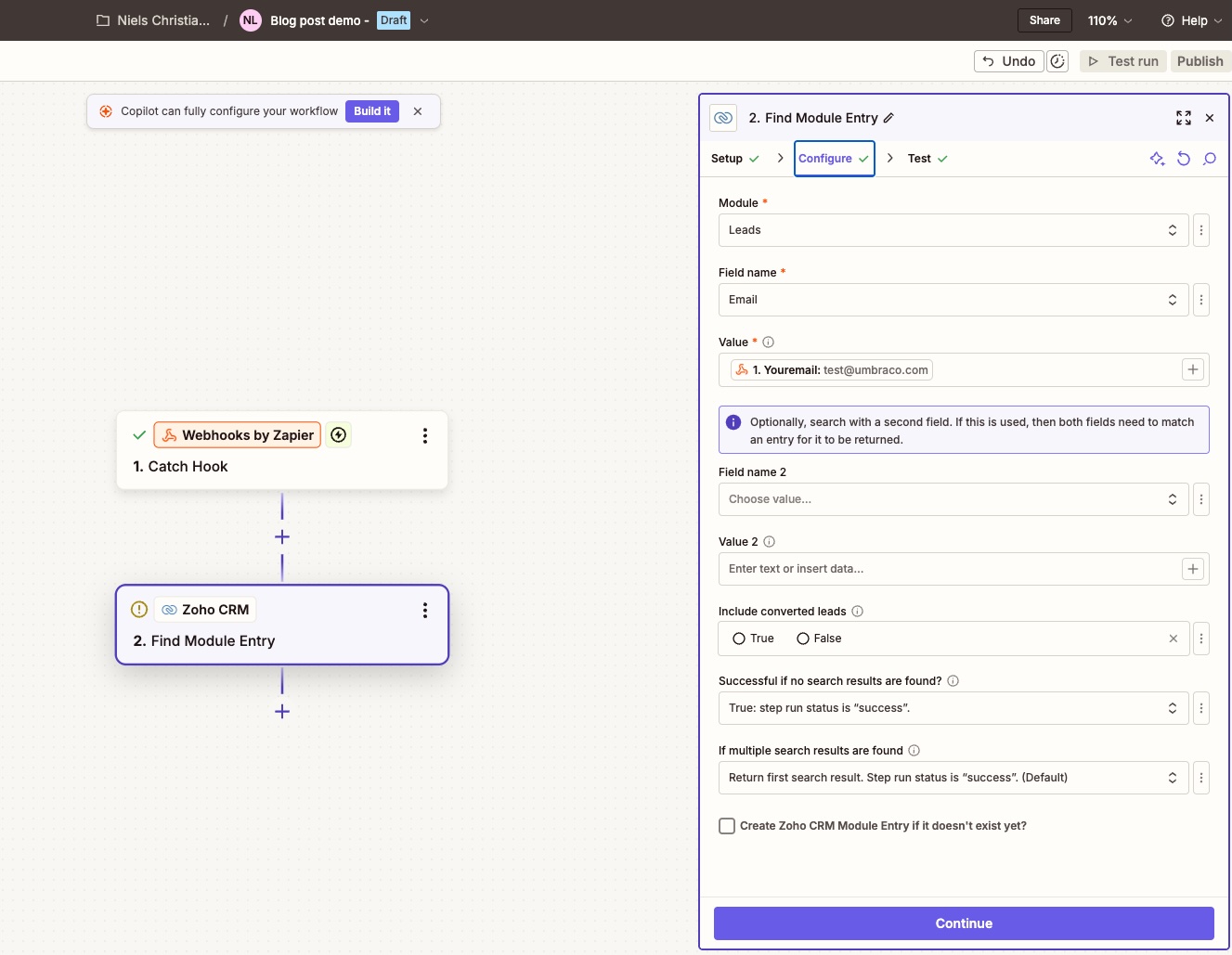 Zapier workflow with a Webhooks by Zapier trigger and a Zoho CRM “Find Module Entry” step configured to search leads by email to avoid duplicates