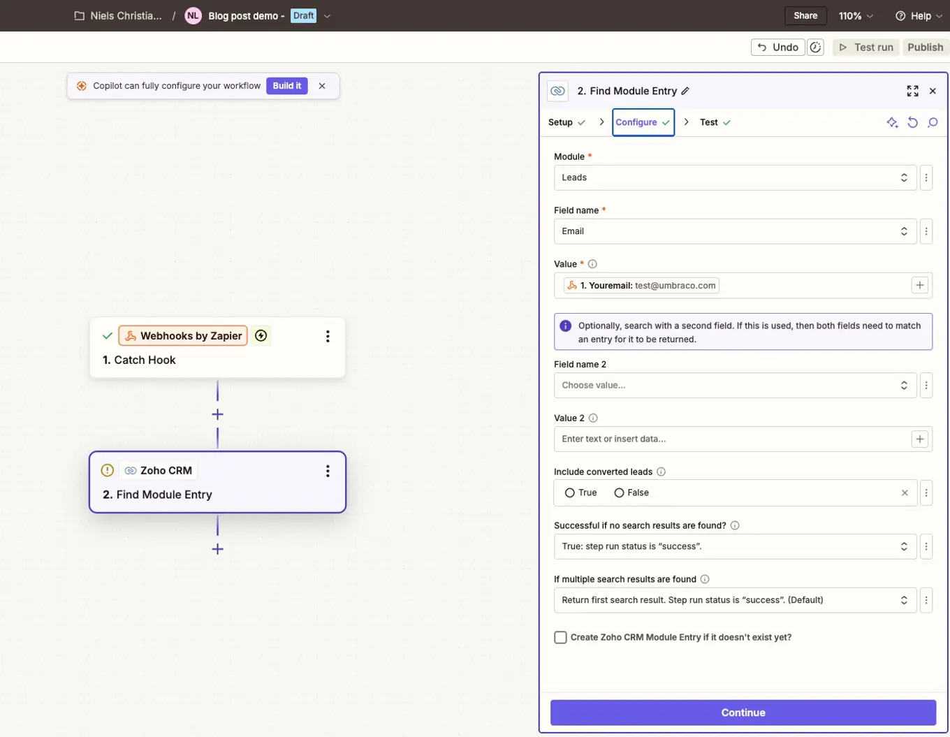 Zapier workflow with a Webhooks by Zapier trigger and a Zoho CRM “Find Module Entry” step configured to search leads by email to avoid duplicates