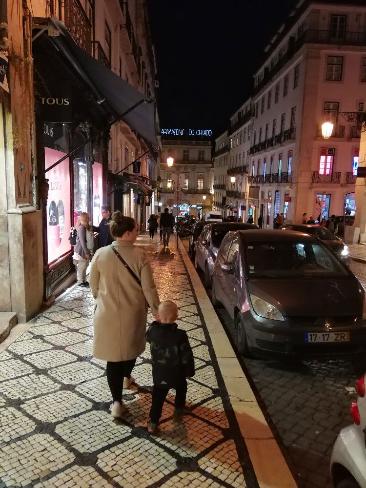 Rasmus Burich family walking in Lisbon at night