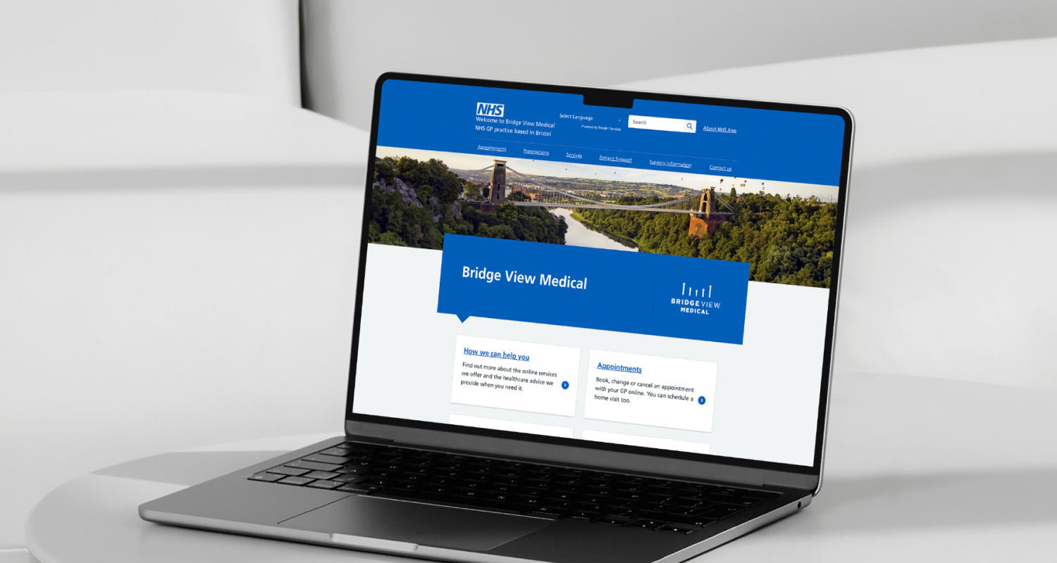 A laptop displaying the Bridge View Medical homepage, which features a scenic banner of the Clifton Suspension Bridge and clear call-to-action buttons for online help and appointments.