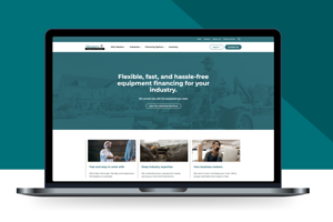 Western Equipment Finance website shown on a laptop screen with financing headline and three service cards