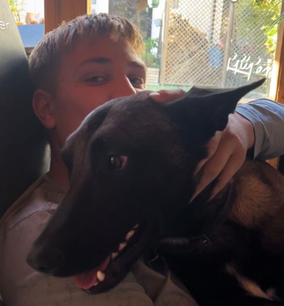 Jay jumping on me while working